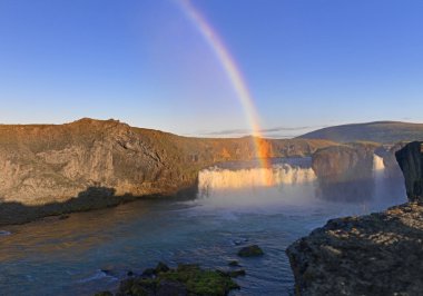 Rainbow across Waterfall clipart
