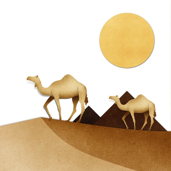 Camel and pyramid on desert Recycled Paper craft — 스톡 사진