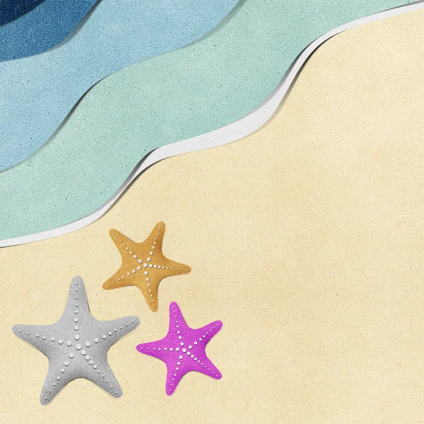 Морские звезды на пляже переработанный бумажный фон — стоковое фото