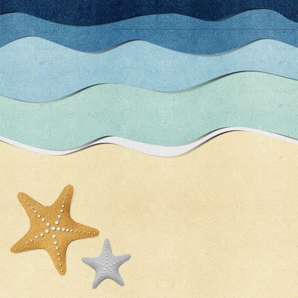 stock image Starfish on beach recycled papercraft background