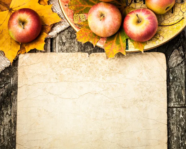 Autumn border from apples and leaves — Stock Photo, Image