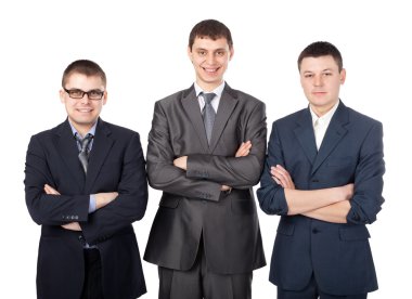 Three young smiling business men standing with folded hands isol clipart