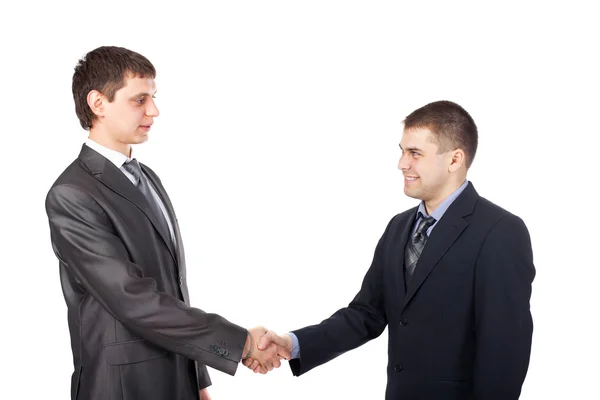 Jonge zakenmannen schudden handen geïsoleerd op witte achtergrond — Stockfoto