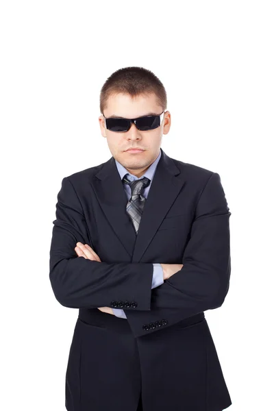 Sicherheitsmann mit Anzug und Sonnenbrille isoliert auf weißem B — Stockfoto