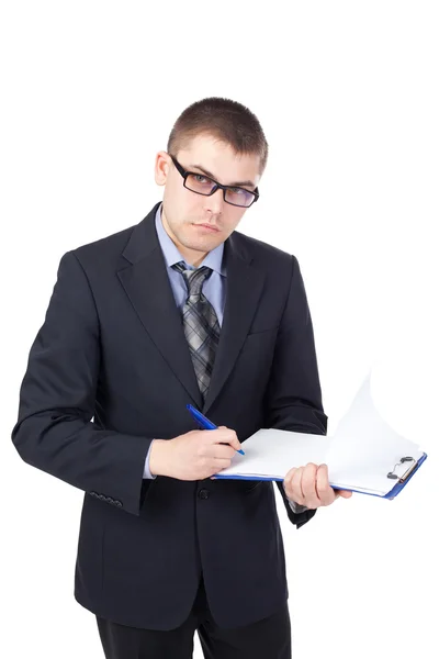 Jonge zakenman ondertekenen van documenten geïsoleerd op een witte pagina — Stockfoto
