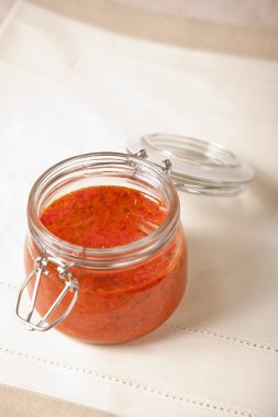 Spicy tomato sauce in a mason jar clipart