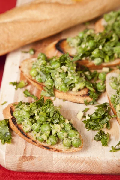 stock image Tasty bruschetta with green vegetables