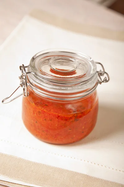 stock image Spicy tomato sauce in a jar