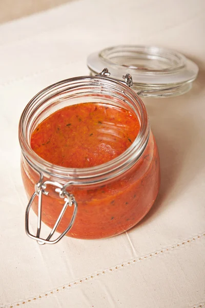 stock image Spicy tomato sauce in a jar