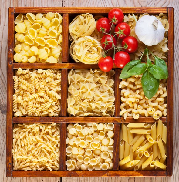 Pasta variety in a compartmented box — Stock Photo, Image