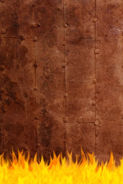 Grunge rusty surface on fire — Stock Photo, Image