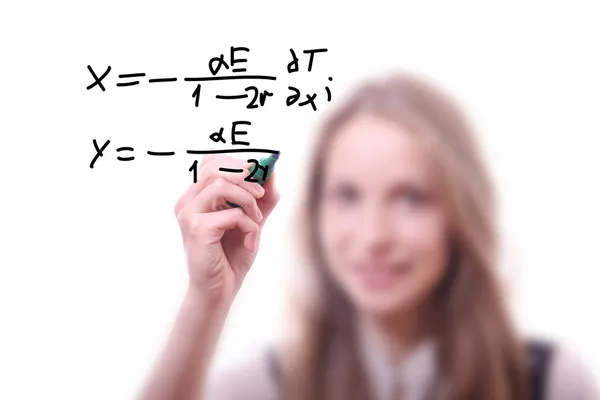Mulher escreve a fórmula — Fotografia de Stock