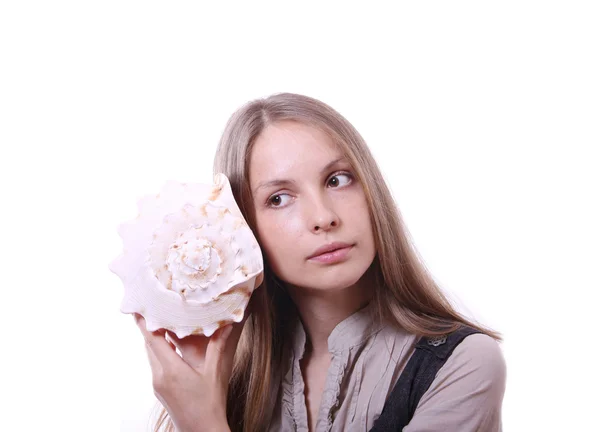 Young woman holding a shell — Stock Photo, Image