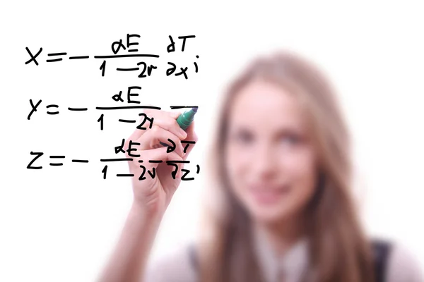 Mulher escreve a fórmula — Fotografia de Stock