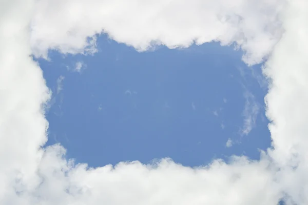 Cloudy frame, blue sky — Stock Photo, Image