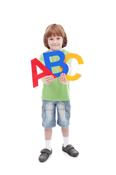 Terug naar school concept met kind en alfabet letters — Stockfoto
