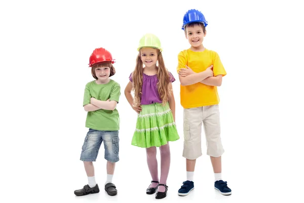 Kids with protective helmets posing — Stock Photo, Image