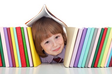 Mischievous kid with freckles and books clipart