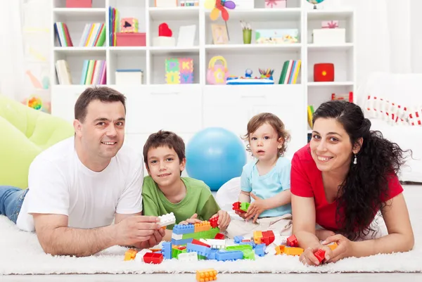 Kids with their parents playing — Stock Photo, Image
