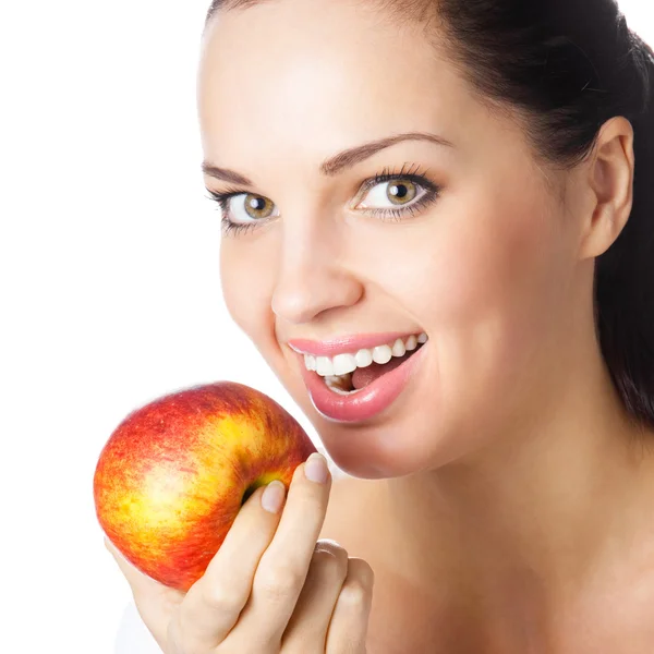 Mujer joven comiendo manzana, aislada — Foto de Stock