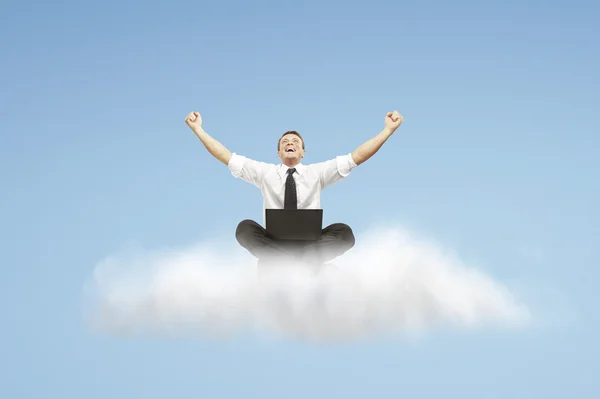 Succes van man zit op een wolk — Stockfoto