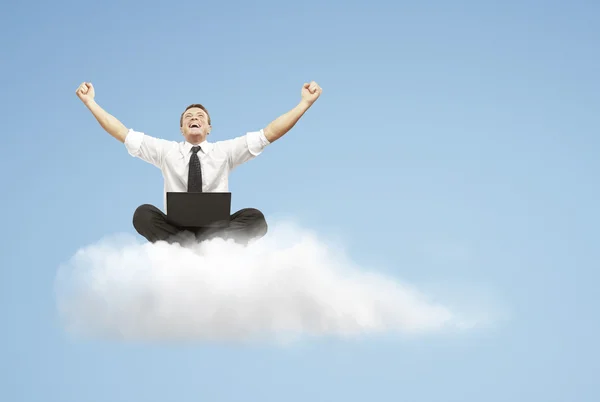Hombre de negocios exitoso en primer plano en la nube —  Fotos de Stock