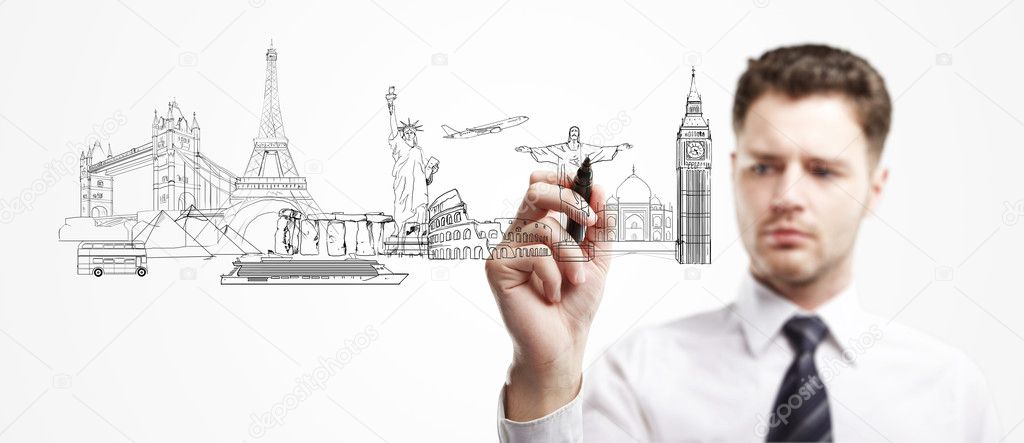 Businessman draws architectural buildings
