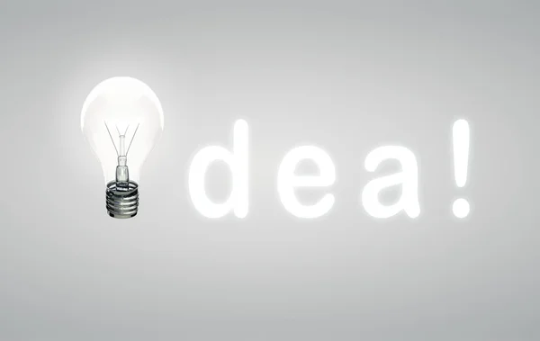 Idea og lampe – stockfoto