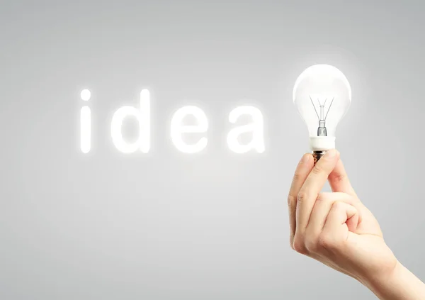 Lamp in hand, concept idea — Stock Photo, Image