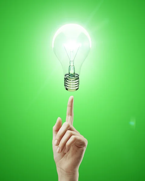 Bulb and hand — Stock Photo, Image