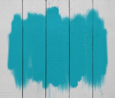 Blue paint in wood plank clipart