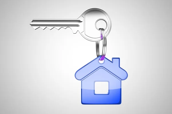 Key chain in form of home — Stock Photo, Image