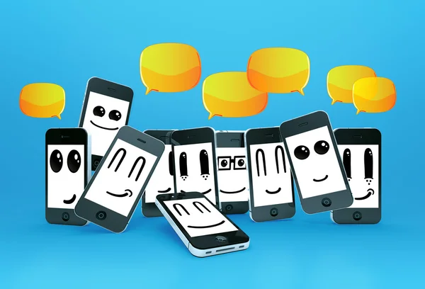 Teléfonos emoticonos con burbujas de habla — Foto de Stock