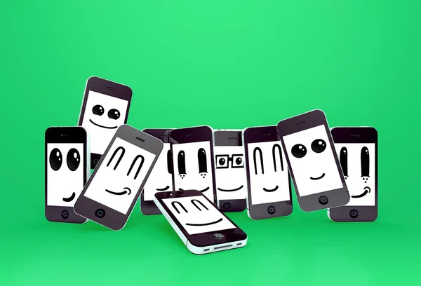 Teléfonos móviles emoticonos — Foto de Stock