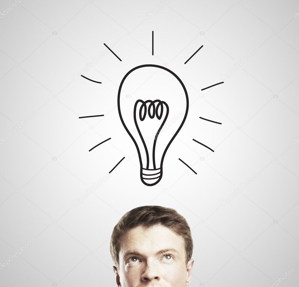 Businessman with lamp