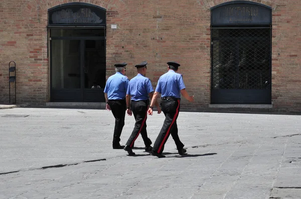 stock image Police in uniform walking