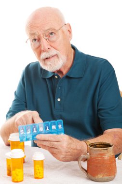 Senior Man Forgot to Take Medicine clipart