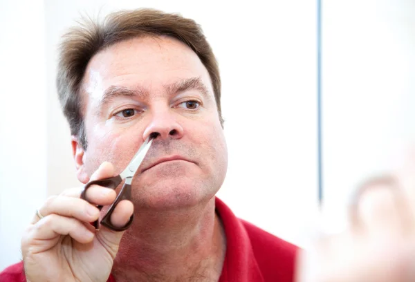 Trimming Nose Hair — Stock Photo, Image