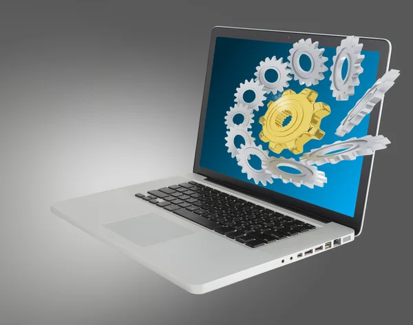 Gears on notebook screen — Stock Photo, Image