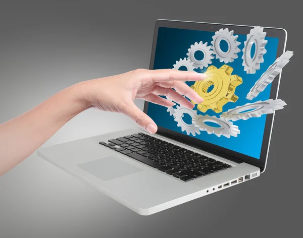 Hand pushing on a touch gears on screen — Stock Photo, Image