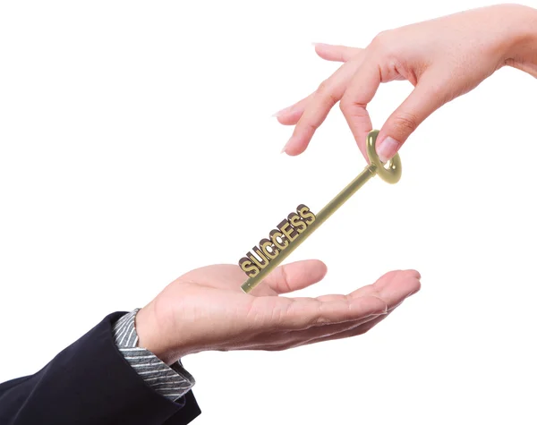 Business man offering key to success to others — Stock Photo, Image