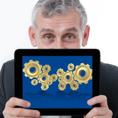 Business man showing one computer tablet with 3d gear for collab clipart