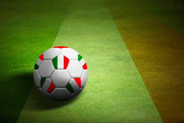 Bandera de Italia con pelota de fútbol sobre hierba de fondo - Euro 2012 — Foto de Stock
