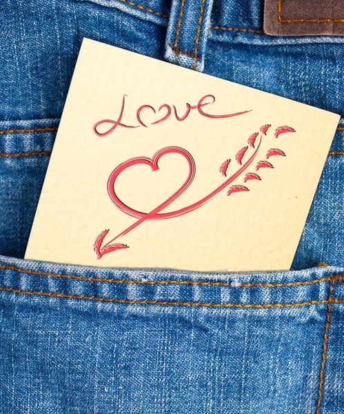 Kärlek i pocket av jean — Stockfoto