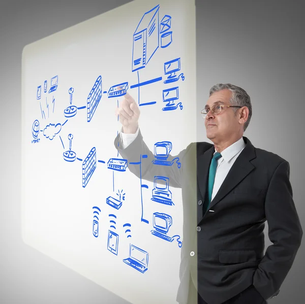 Businessman touching a security plan for a firewall system — Stock Photo, Image