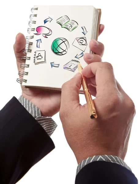 Business man writing collaboration diagram on book — Stock Photo, Image