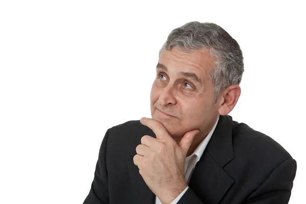 Portrait of a senior business man thinking something — Stock Photo, Image