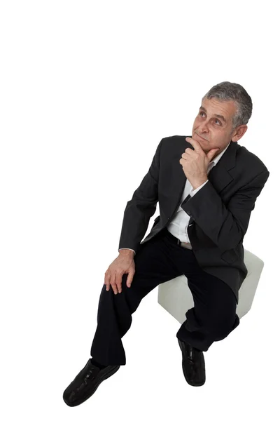 Portrait of a senior business man thinking something — Stock Photo, Image