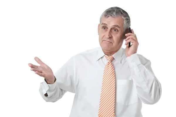 Ritratto di un uomo d'affari anziano che chiama usando il cellulare — Foto Stock