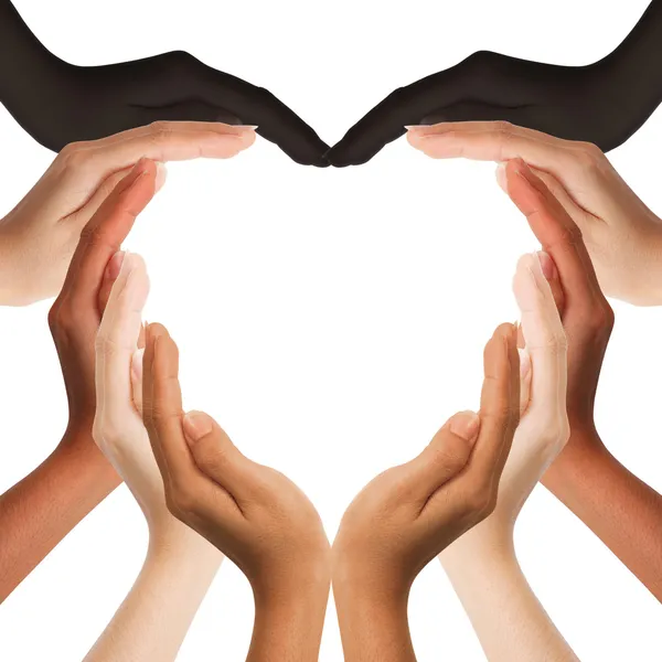 Multiracial human hands making a heart shape on white background Stock Photo